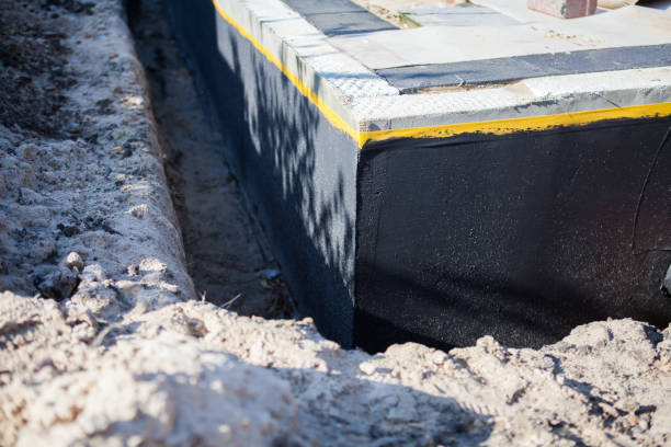 Professional Waterproofing technician working in Rawson, OH